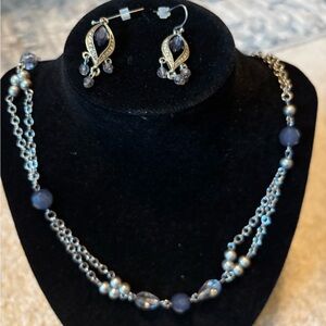 Lovely necklace & earring set. Silver with blue and crystal beads.Excellent cond